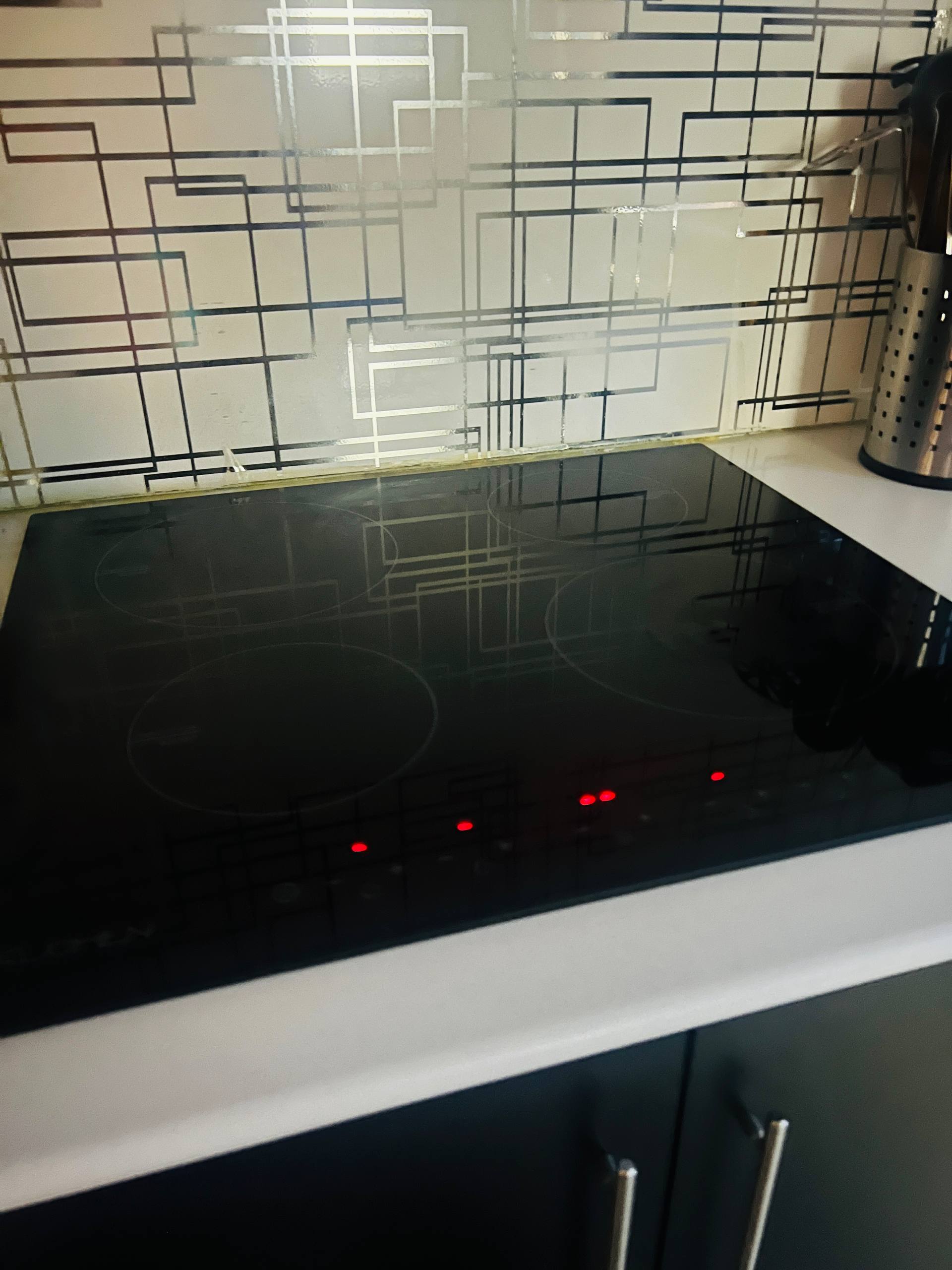 Four-zone induction cooktop close-up